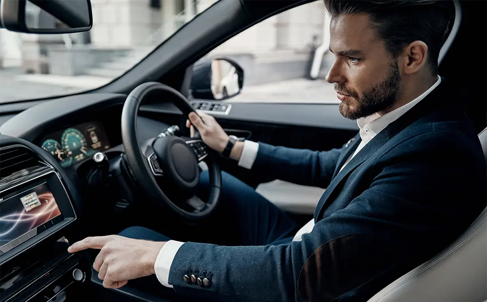 business driver sat in saloon car